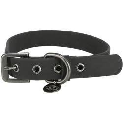 Collar Trixie para perro en PVC negro, con hebilla metálica, anilla de sujeción y diseño impermeable resistente para uso diario.